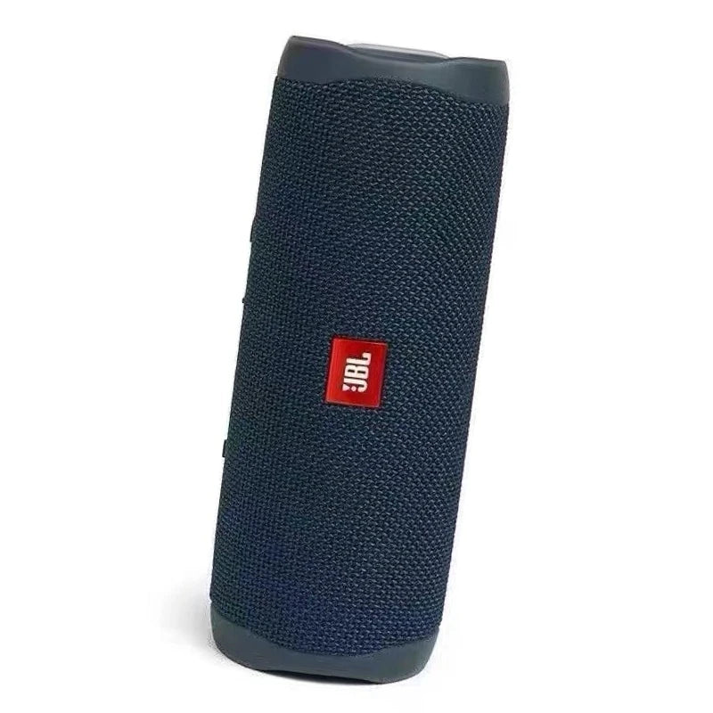 Enceinte Bluetooth portable JBL Flip 5, étanche IPX7, avec mini caisson de basses et basses profondes, idéale pour le camping et le sport en extérieur.